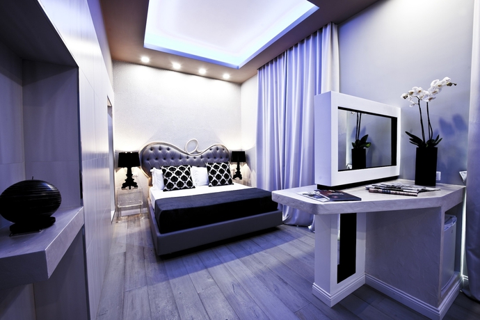 Imagen de la habitación del Hotel Corso Boutique Luxury Rooms. Foto 6