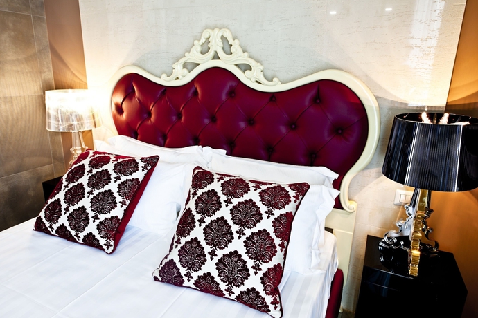 Imagen de la habitación del Hotel Corso Boutique Luxury Rooms. Foto 8