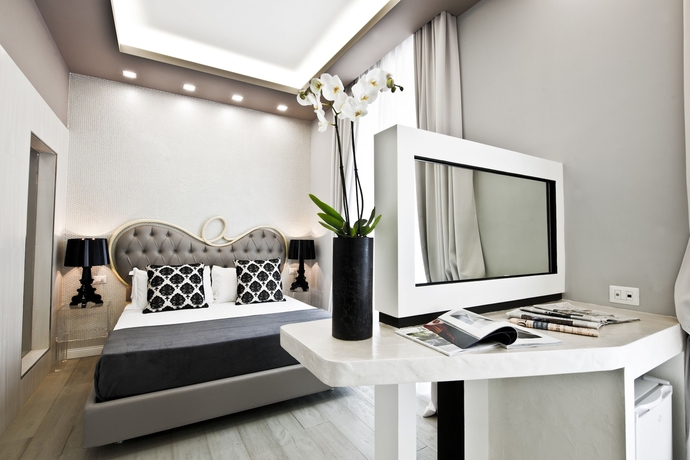 Imagen de la habitación del Hotel Corso Boutique Luxury Rooms. Foto 10
