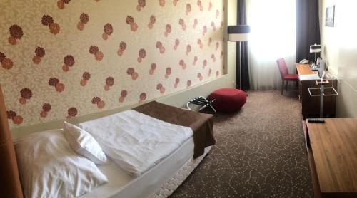Imagen de la habitación del Hotel Corso Pécs. Foto 6