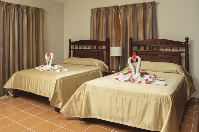 Imagen de la habitación del Hotel Cortecito Inn Bavaro. Foto 10