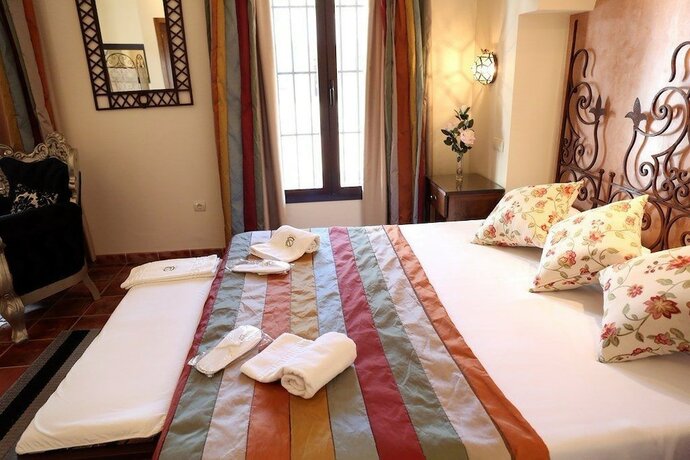 Imagen de la habitación del Hotel Cortijo Los Naranjos de San Juan. Foto 12