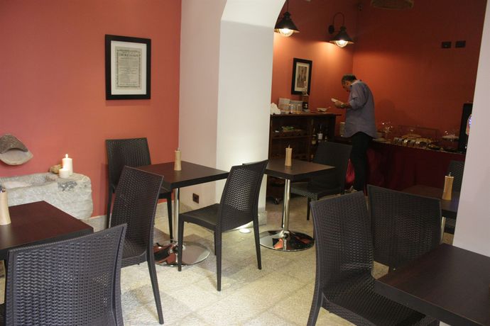 Imagen del bar/restaurante del Hotel Cortile Di Venere Bed and Breakfast. Foto 2