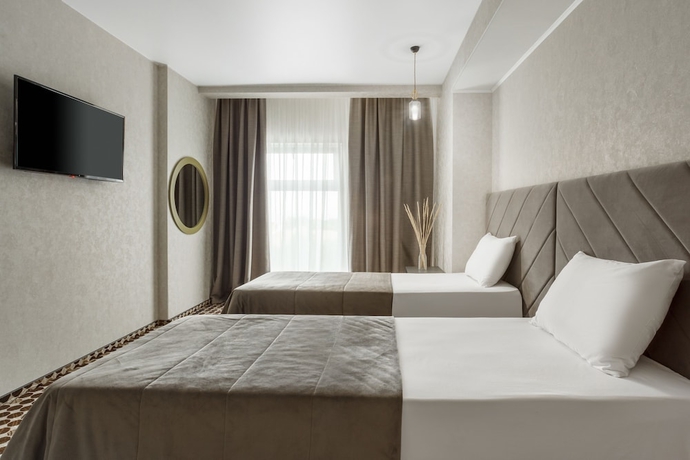 Imagen de la habitación del Hotel Corudo Family Resortandspa. Foto 7