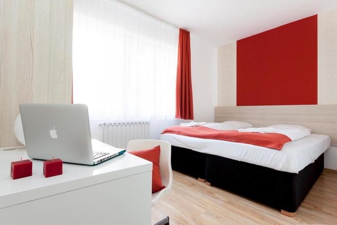 Imagen de la habitación del Hotel Corvin Plaza Apartments Y Suites. Foto 4