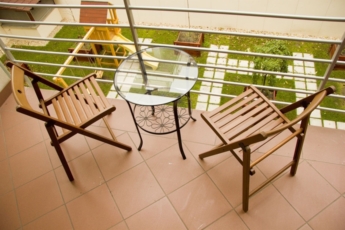 Imagen de la habitación del Hotel Corvin Plaza Apartments Y Suites. Foto 11