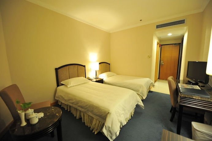 Imagen de la habitación del Hotel Cosco Inn. Foto 5