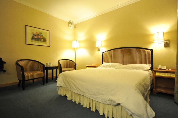 Imagen de la habitación del Hotel Cosco Inn. Foto 8