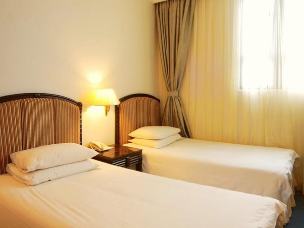 Imagen de la habitación del Hotel Cosco Inn. Foto 9