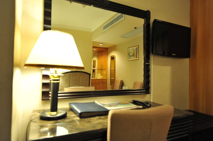 Imagen de la habitación del Hotel Cosco Inn. Foto 10
