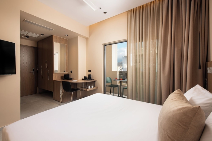 Imagen de la habitación del Hotel Cosmeen Lifestyle Boutique Stay. Foto 12