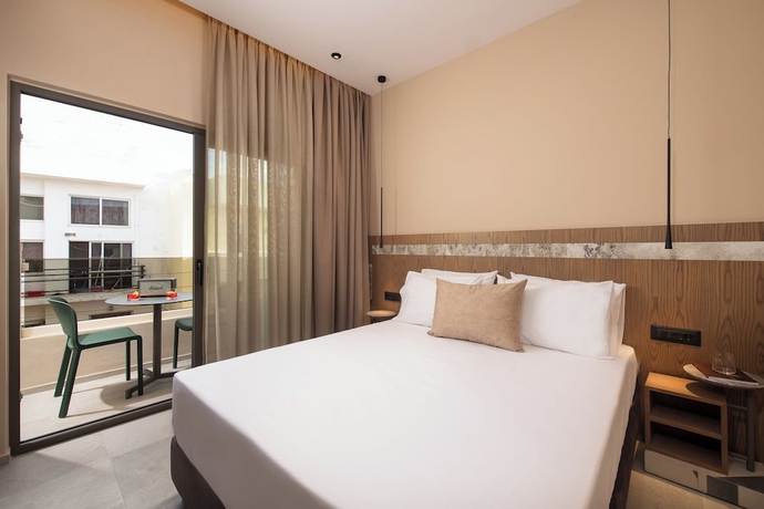 Imagen de la habitación del Hotel Cosmeen Lifestyle Boutique Stay. Foto 14