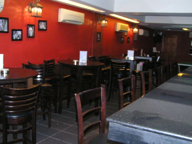 Imagen del bar/restaurante del Hotel Cosmic Boutique. Foto 4