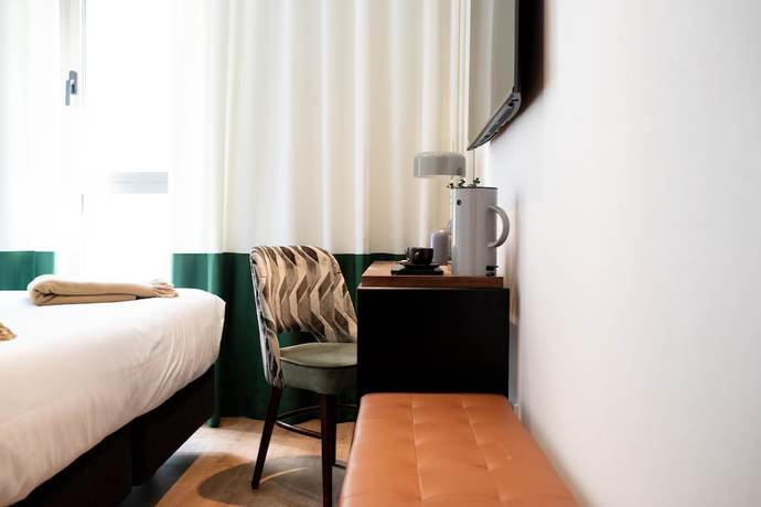 Imagen de la habitación del Hotel Cosmo Boutique. Foto 15