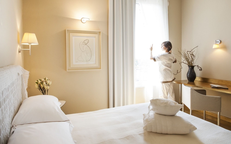 Imagen de la habitación del Hotel Cosmo Hotel Palace. Foto 2