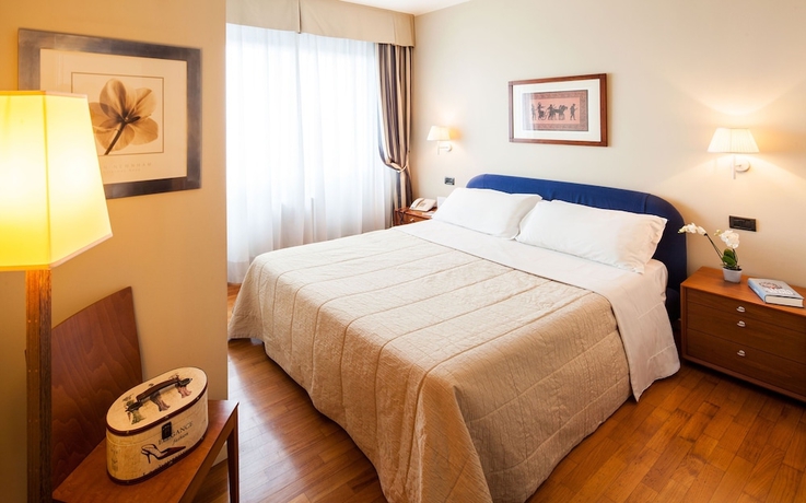 Imagen de la habitación del Hotel Cosmo Residence. Foto 15