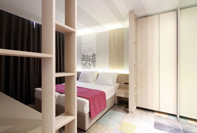 Imagen de la habitación del Hotel Cosmopolit. Foto 5