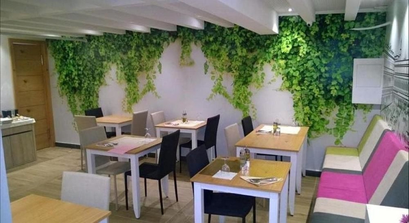 Imagen del bar/restaurante del Hotel Cosmopolit. Foto 2