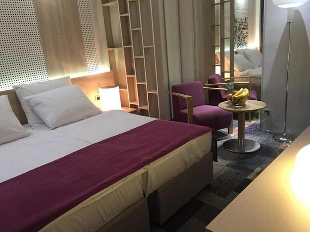 Imagen de la habitación del Hotel Cosmopolit. Foto 6