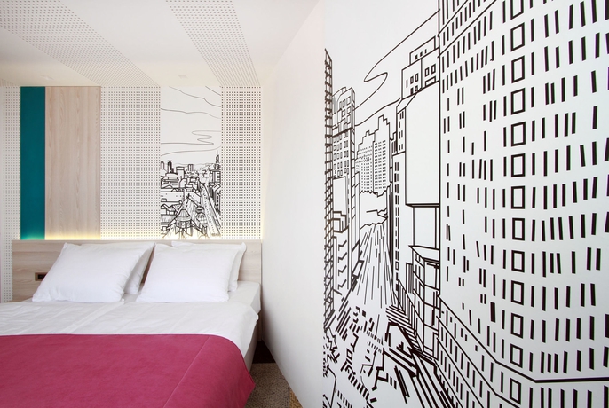 Imagen de la habitación del Hotel Cosmopolit. Foto 8