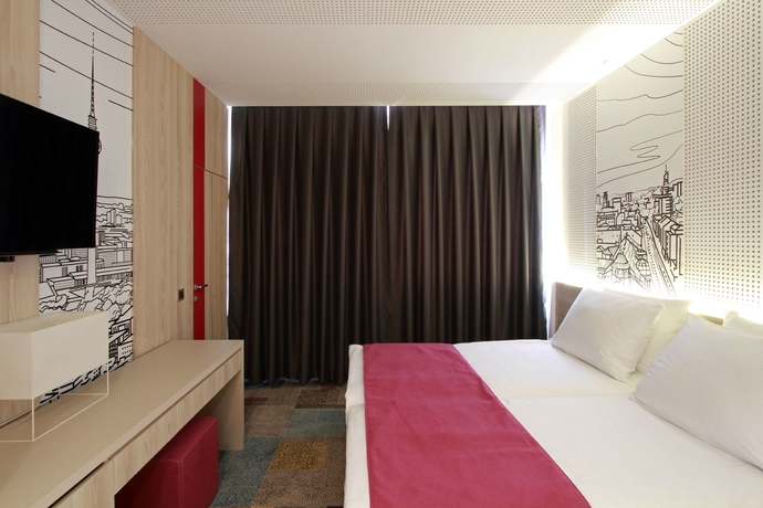 Imagen de la habitación del Hotel Cosmopolit. Foto 11