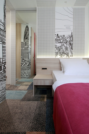 Imagen de la habitación del Hotel Cosmopolit. Foto 15