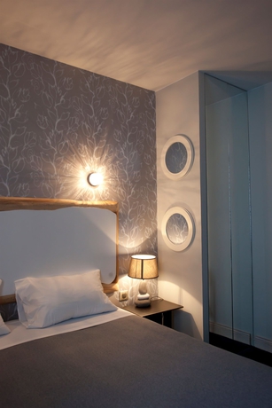 Imagen de la habitación del Hotel Cosmopolitain. Foto 2