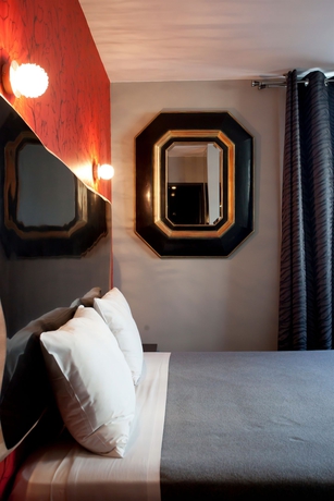 Imagen de la habitación del Hotel Cosmopolitain. Foto 3