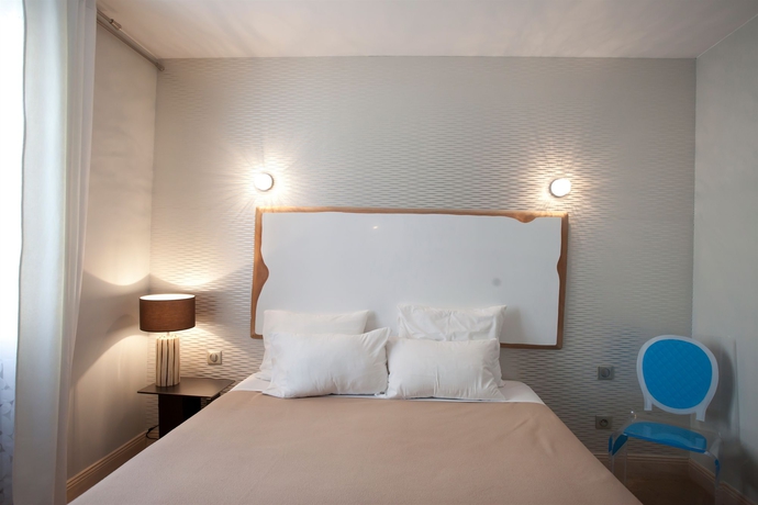 Imagen de la habitación del Hotel Cosmopolitain. Foto 6