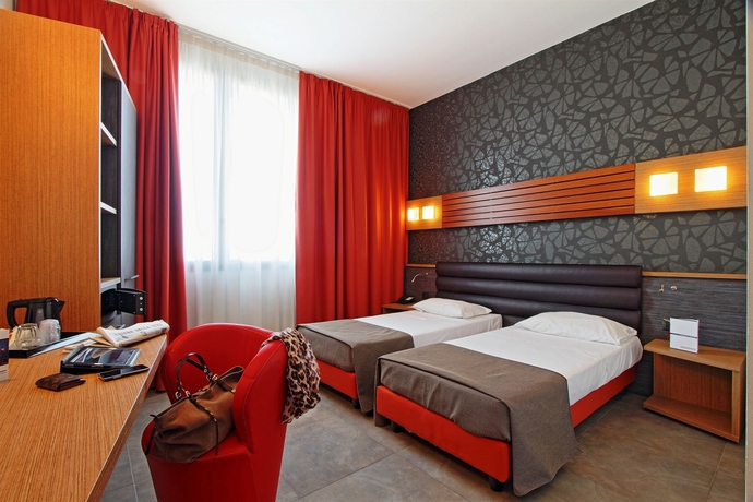 Imagen de la habitación del Hotel Cosmopolitan Bologna. Foto 6