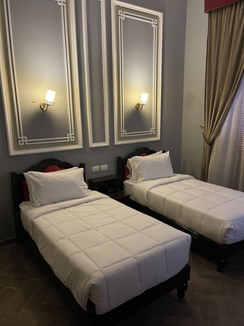 Imagen de la habitación del Hotel Cosmopolitan Cairo. Foto 5