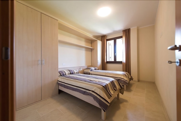 Imagen de la habitación del Hotel Cosmopolitan Golf and Beach Resort. Foto 8