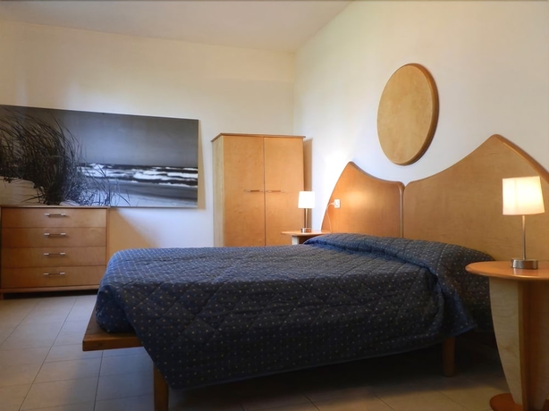 Imagen de la habitación del Hotel Cosmopolitan Golf and Beach Resort. Foto 9