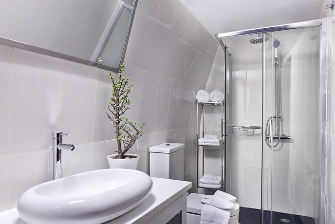 Imagen de la habitación del Hotel Cosmopolitan Suites. Foto 9