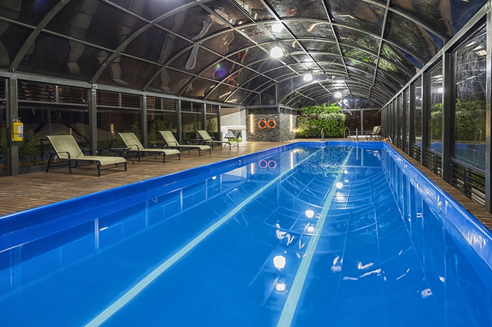 Imagen de la piscina del Hotel Cosmos 100 and Centro De Convenciones. Foto 9