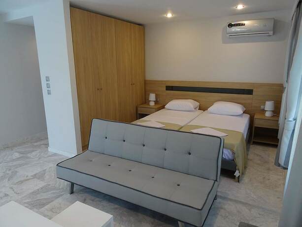 Imagen de la habitación del Hotel Cosmos Apartments. Foto 9