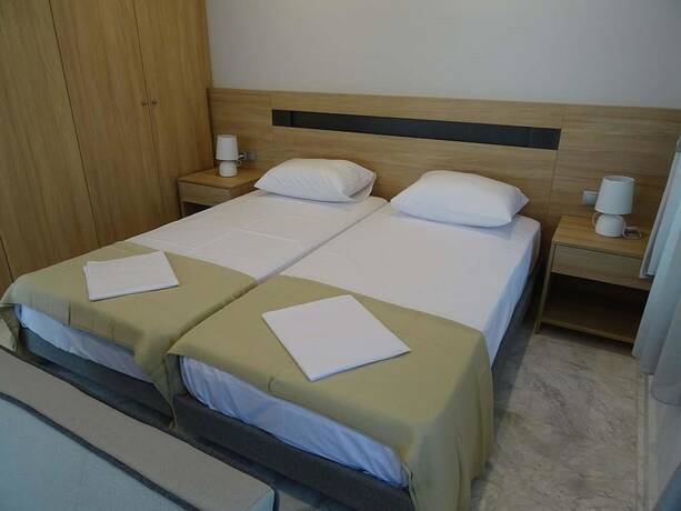 Imagen de la habitación del Hotel Cosmos Apartments. Foto 11