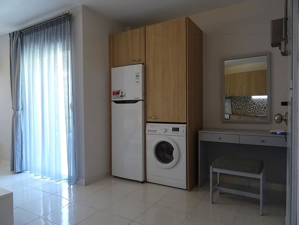 Imagen de la habitación del Hotel Cosmos Apartments. Foto 12