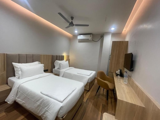 Imagen de la habitación del Hotel Cosmos, Bhubaneshwar. Foto 9