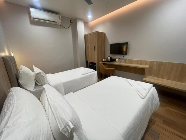 Imagen de la habitación del Hotel Cosmos, Bhubaneshwar. Foto 10