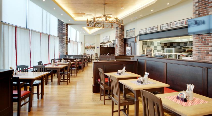 Imagen del bar/restaurante del Hotel Cosmos Novosibirsk , A Member Of Radisson Individuals. Foto 2