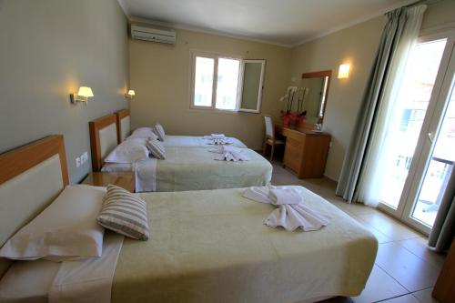 Imagen de la habitación del Hotel Cosmos, Vasiliki. Foto 4