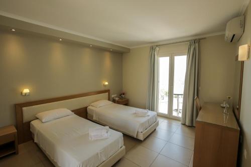 Imagen de la habitación del Hotel Cosmos, Vasiliki. Foto 6