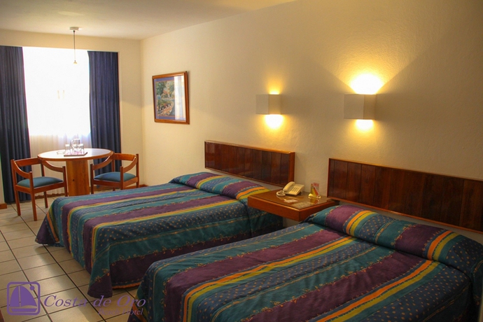 Imagen de la habitación del Hotel Costa De Oro Beach. Foto 3