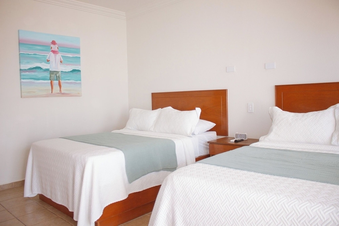 Imagen de la habitación del Hotel Costa Elegante and Suites. Foto 6