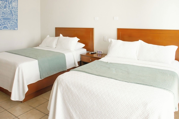 Imagen de la habitación del Hotel Costa Elegante and Suites. Foto 8