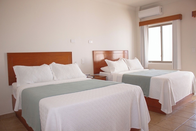 Imagen de la habitación del Hotel Costa Elegante and Suites. Foto 14