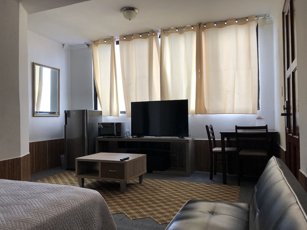 Imagen de la habitación del Hotel Costa Inn. Foto 3