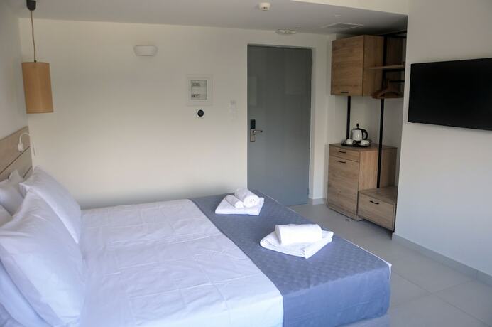 Imagen de la habitación del Hotel Costa Ionica Mytikas Seaside. Foto 12