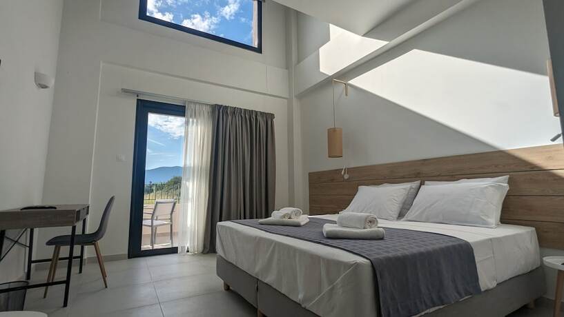 Imagen de la habitación del Hotel Costa Ionica Mytikas Seaside. Foto 14